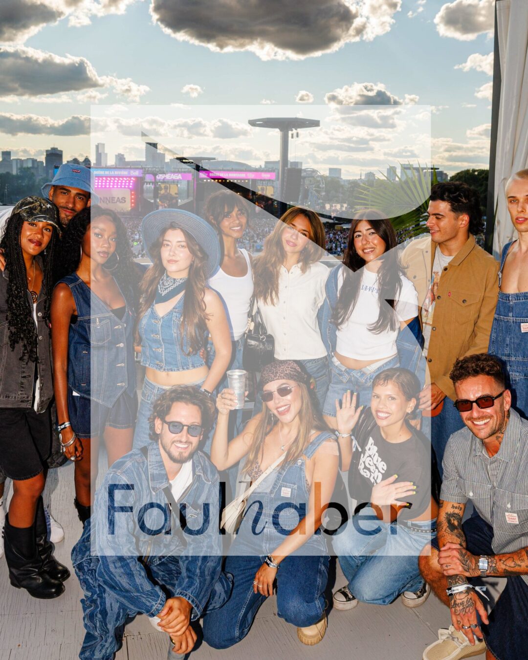 Diverse group of young adults in denim posing on a rooftop with a city skyline; translucent 'Founder' overlay across the image.